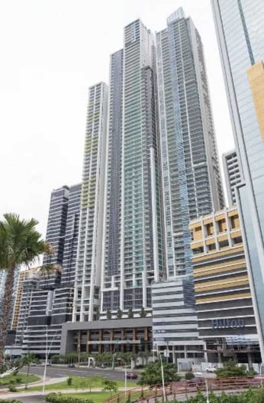 Luxury high-rise condominium Yoo Panama designed by Philippe Starck with glass facade in Panama City