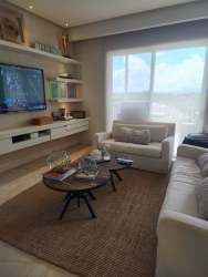 Modern luxury kitchen with island stainless appliances in beachfront condo Panama