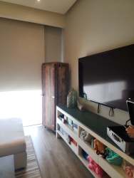 Luxurious bedroom with oceanfront balcony access in Buenaventura Panama beach apartment