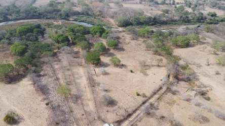 Aerial view of large rural land with river access in Los Olivos Pedasí Panama