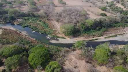 River meandering along farmland countryside Pedasí Los Santos Panama