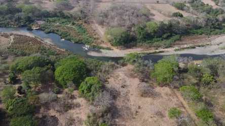 Aerial with river view and countryside vegetation in Tonosí Pedasí Los Santos Panama