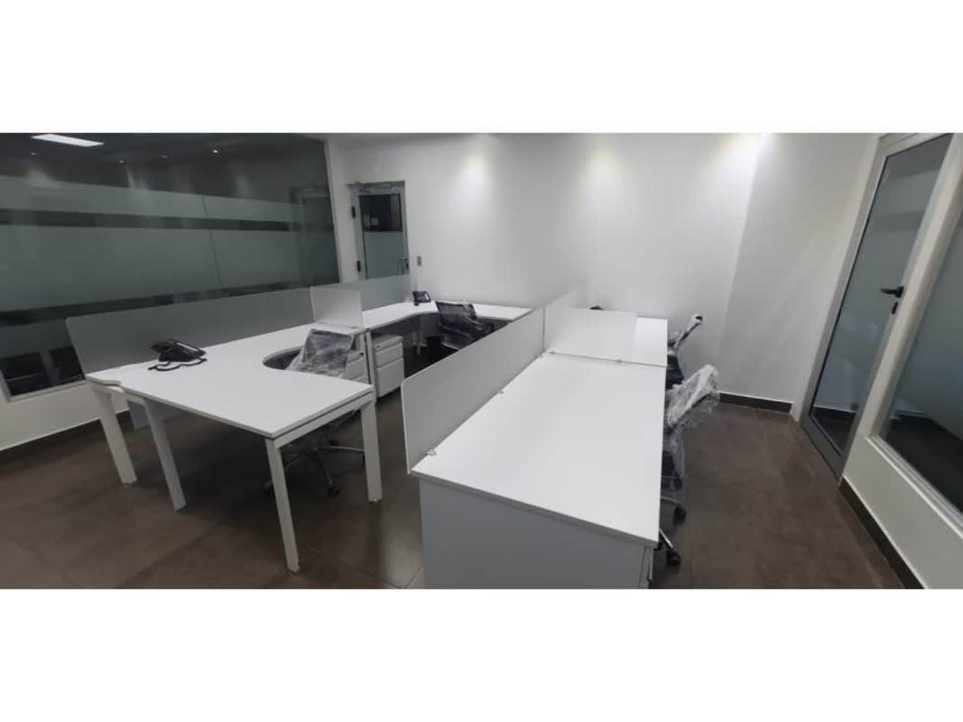 Modern office workstations with glass partitions PH BICSA Tower