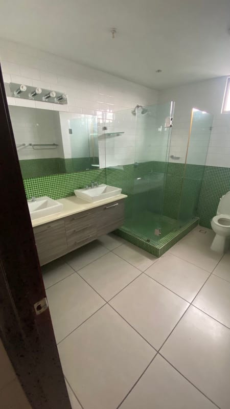Bathroom with double sink vanity, glass shower, mosaic tiles PH 4H Panama