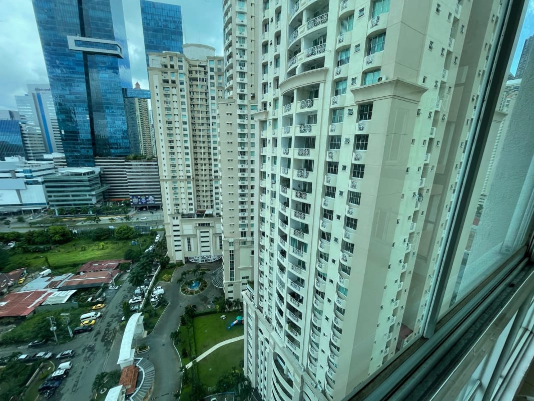 Swimming pool with sundeck landscaped gardens PH Costa Pacifica Panama
