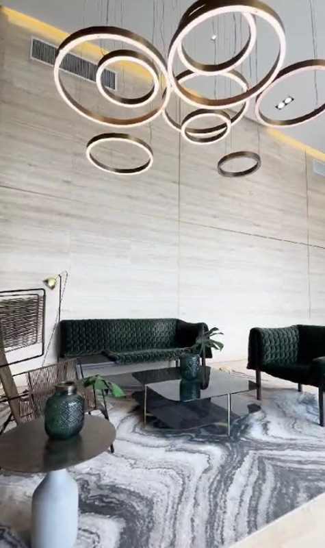 Rooftop infinity pool with sun loungers panoramic skyline view PH The Towers Panama