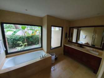 Living room with vaulted ceiling, open concept design in Buenaventura Beach Resort villa Panama