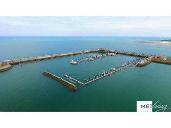 Marina harbor with docks and ocean access at Vista Mar Panama