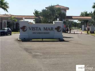 Yachts docked with helicopter flying at Vista Mar marina Panama