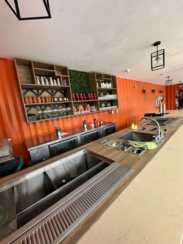 Urban commercial patio with murals, picnic seating Costa del Este Panama