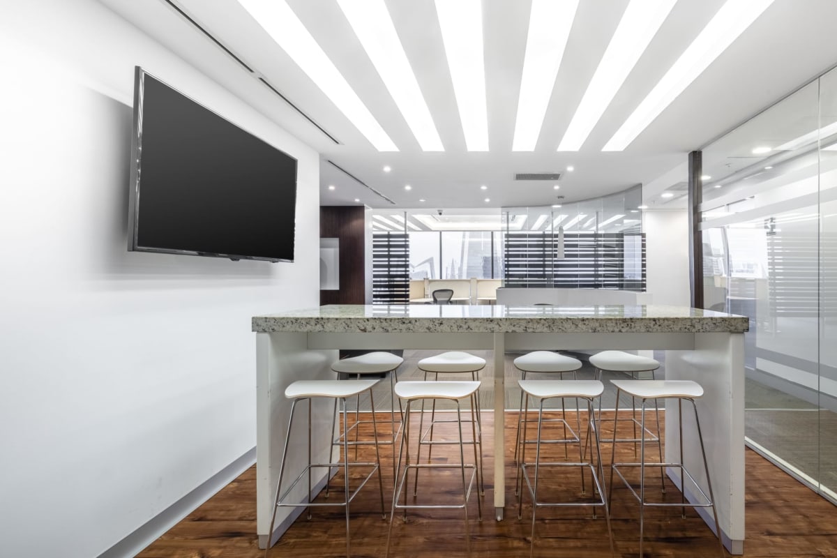 Office interiors with glass walls, carpet floors Tower Financial Center