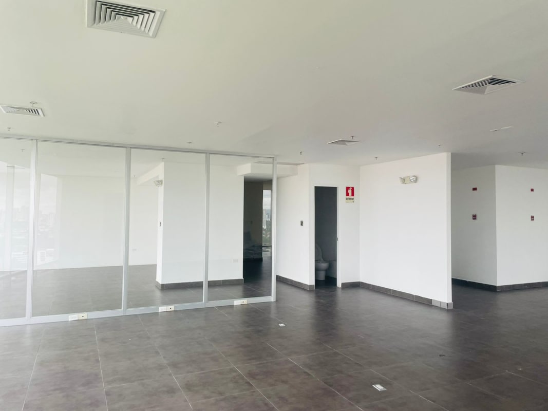 Spacious office space with glass walls tile floors and panoramic windows for rent PH Aseguradora Ancón Panama