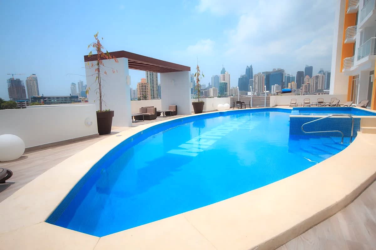 Rooftop swimming pool with skyline views at PH Metropolitan Park Panama City