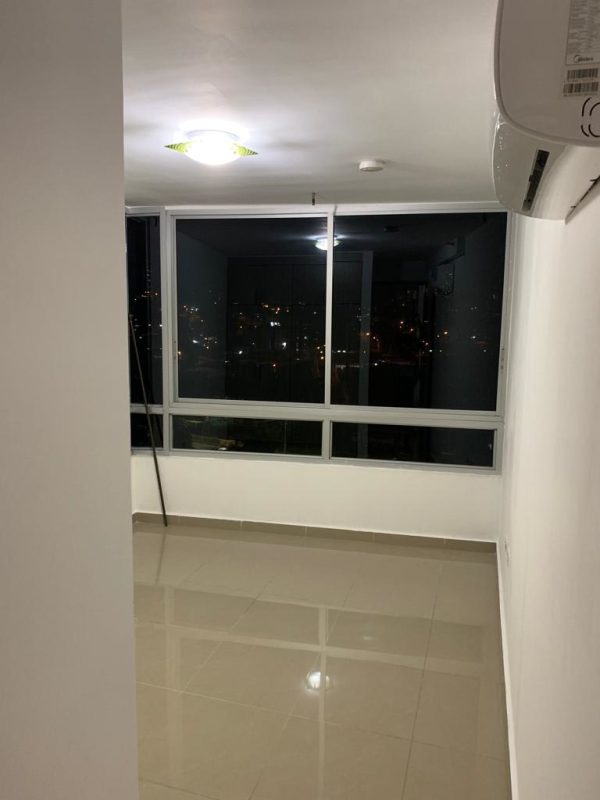 Kitchen with beige cabinetry, granite countertops, appliances at PH River One Panama