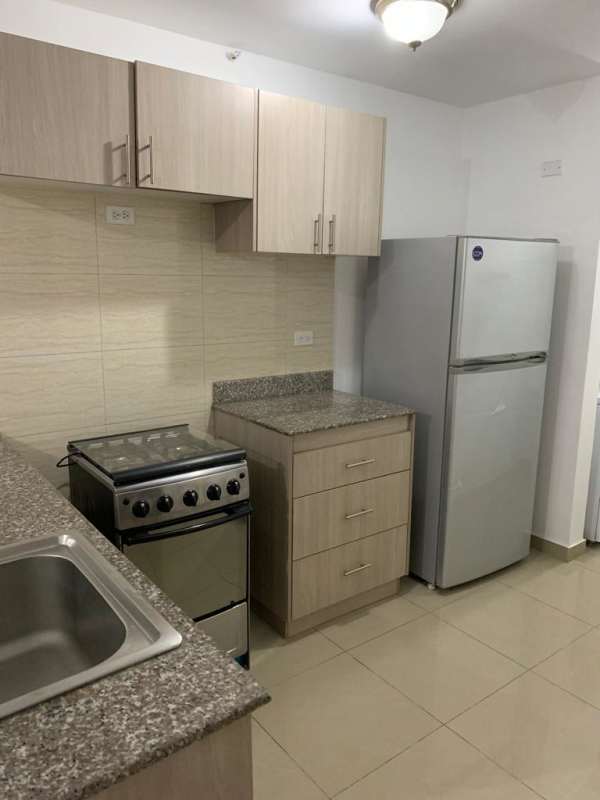 Modern kitchen with granite counter, large window PH River One Rio Abajo Panama