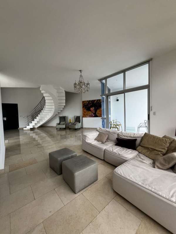 Contemporary kitchen with granite countertops and island PH The Bridge Amador Panama