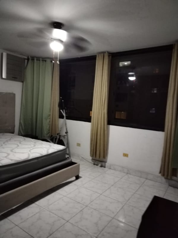 Traditional kitchen with wood cabinets, granite countertop, stainless refrigerator at PH San Francisco