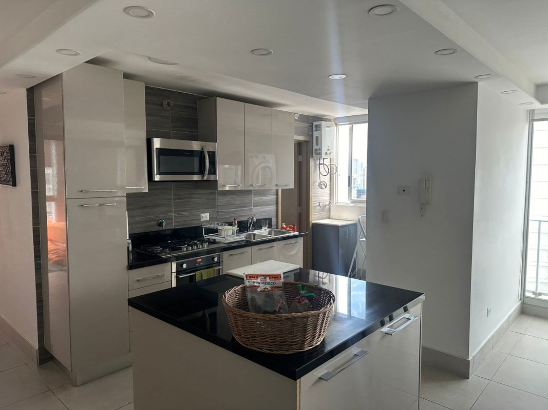 Contemporary kitchen with granite countertops, breakfast bar island, built-in appliances at PH Park City