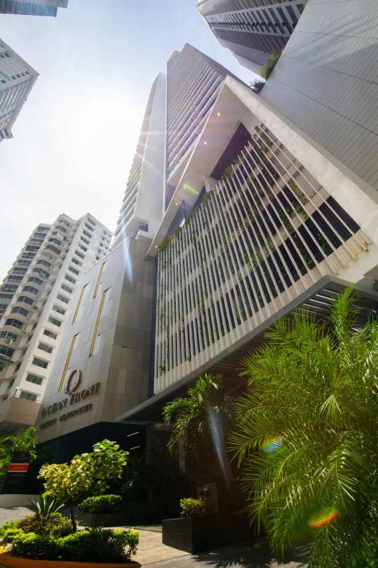 Modern kitchen equipped with granite countertops, stainless appliances at PH Ocean Front penthouse