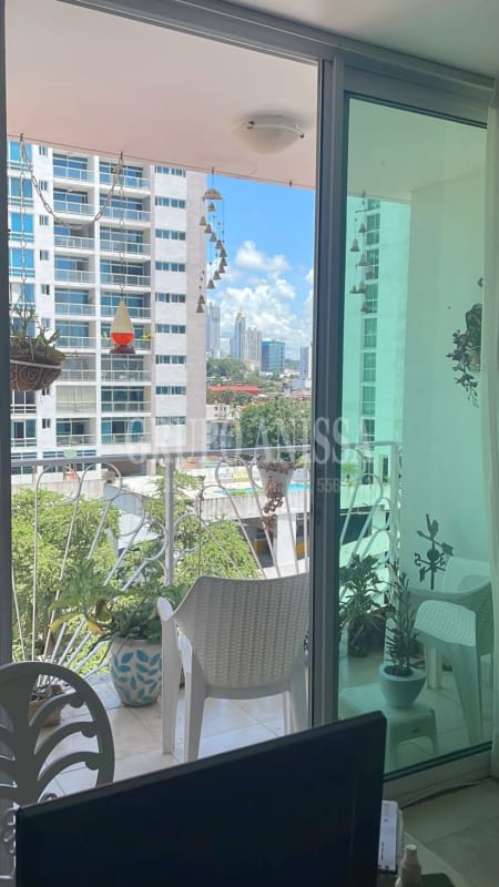 Bright hallway with neutral decor and artwork in PH El Cangrejo condo Panama