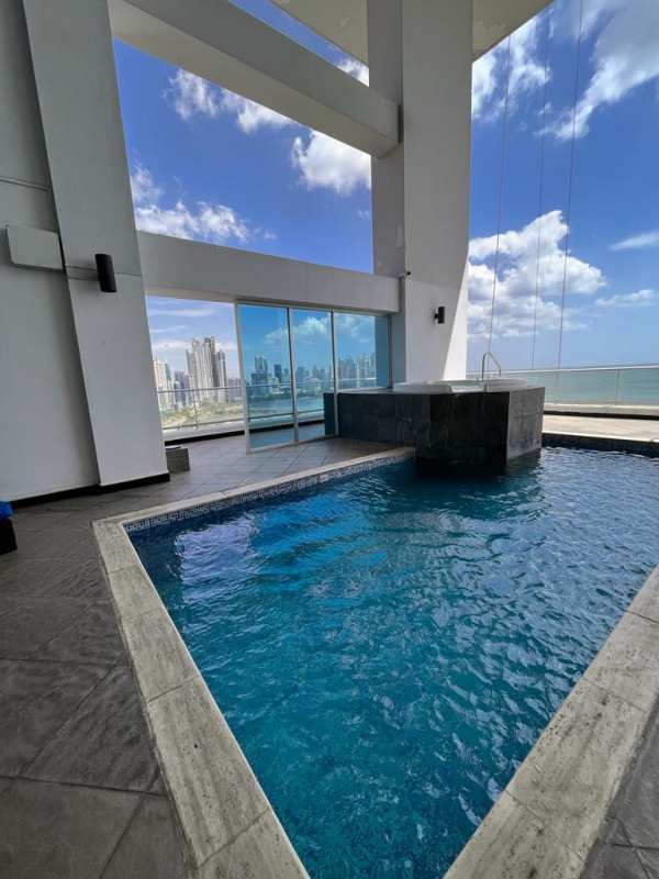Rooftop infinity pool overlooking Pacific Ocean and Panama City skyline at PH Destiny Tower