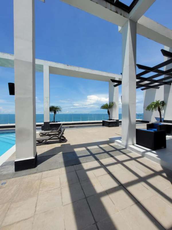 Rooftop infinity pool with unobstructed Pacific Ocean views and skyline at PH Destiny Tower