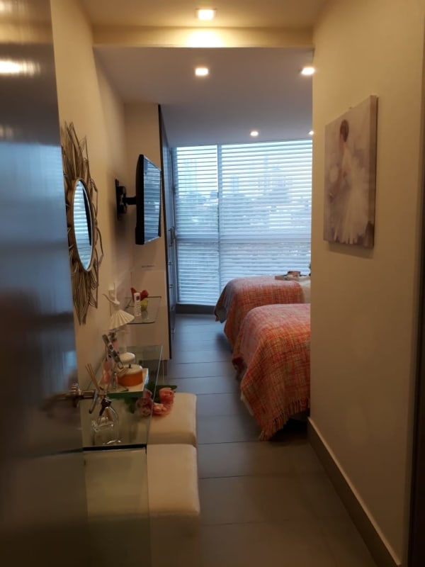 Contemporary bedroom with large window in PH Vista Hermosa Via España Panama