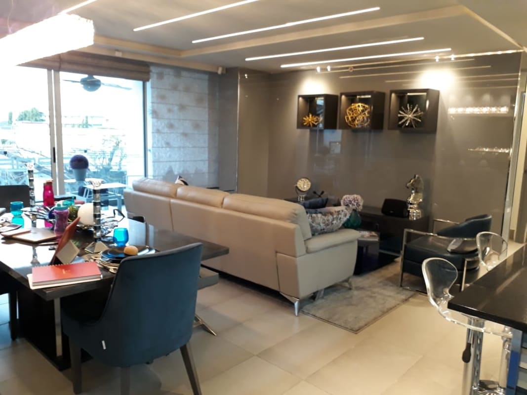 Living room with sliding glass door to balcony PH Vista Hermosa Via España Panama