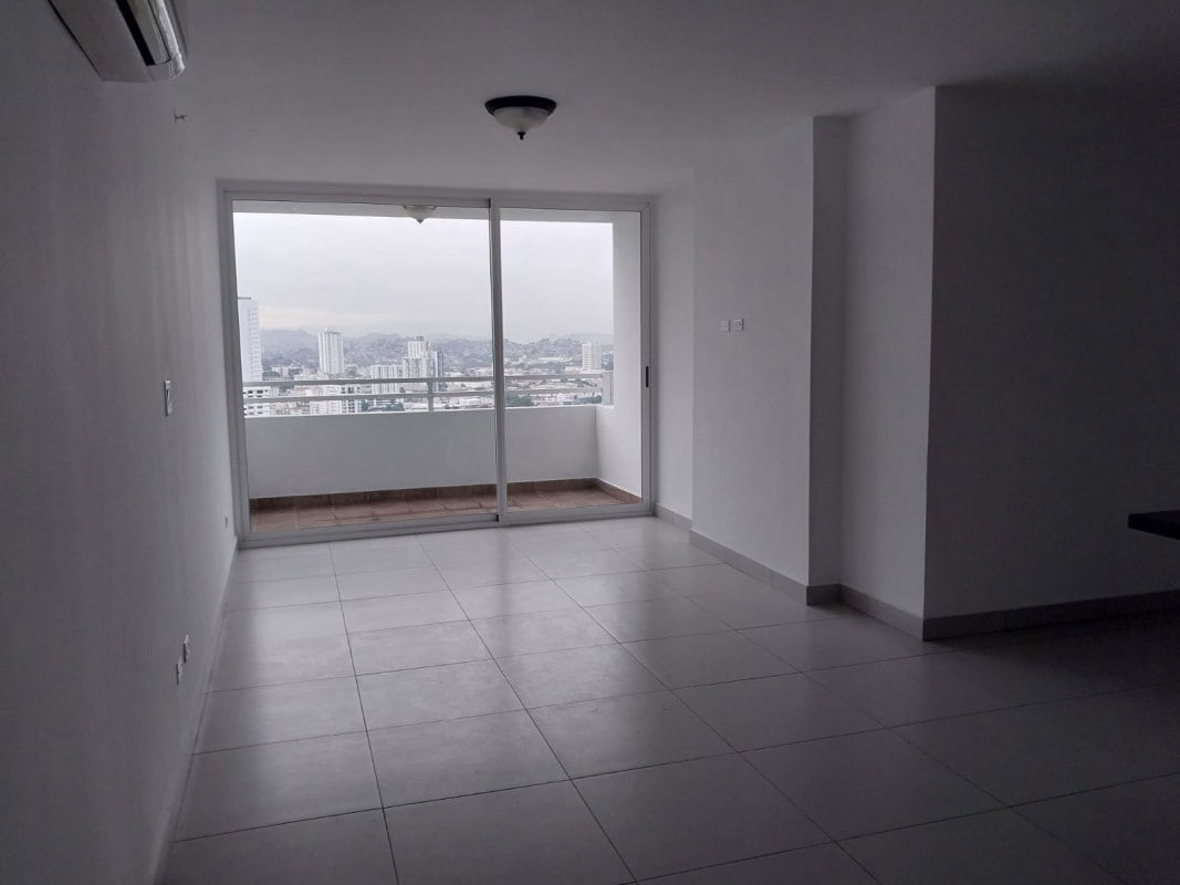 Modern kitchen with granite countertops, gas stove, and in-unit laundry area PH Tee One Panama City