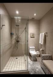 Luxury kitchen with island, granite counters, appliances, large windows with sea view Playa Escondida Panama