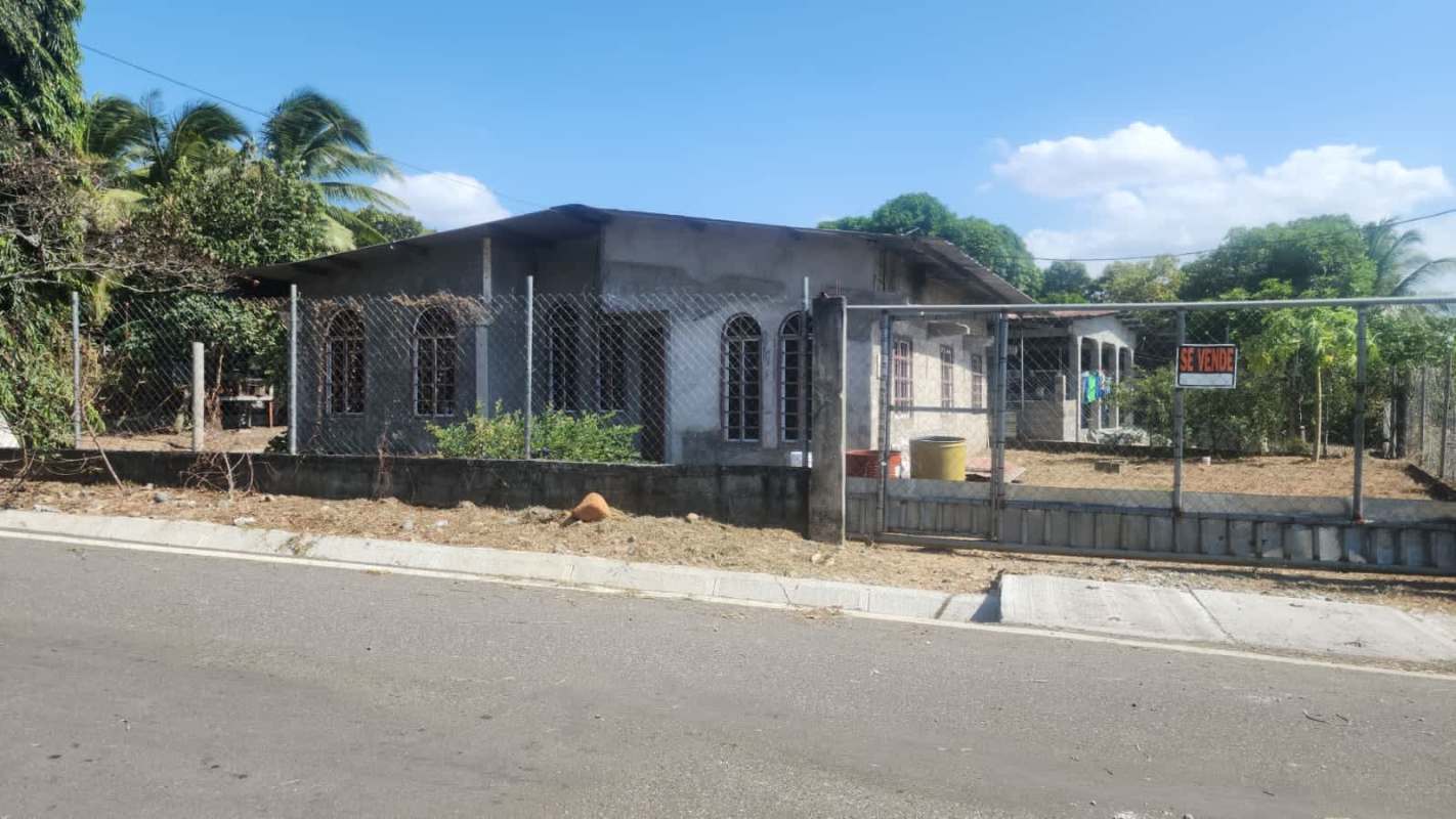 Front exterior with fence and basic unfinished facade Pacora Panama