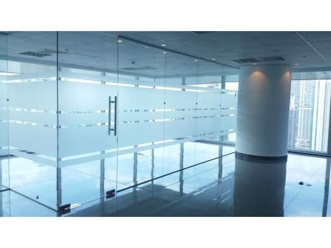 Modern office interior with glass partitions and large windows Oceania Business Plaza Panama City