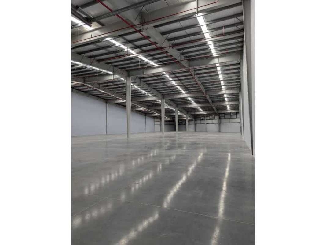 Large empty high ceiling warehouse with polished concrete floors industrial style in Panama City Llano Bonito