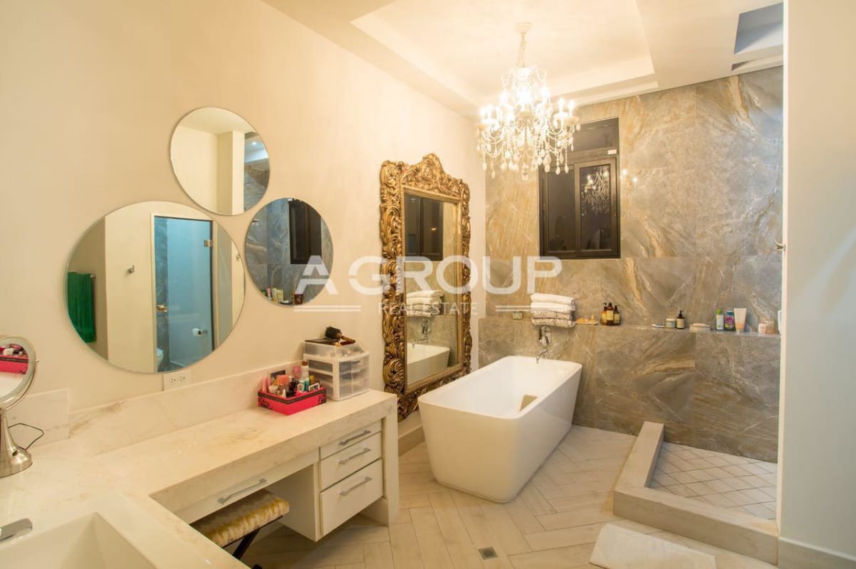 Contemporary living area double height ceiling glass wall pool grand piano luxury house Costa del Este