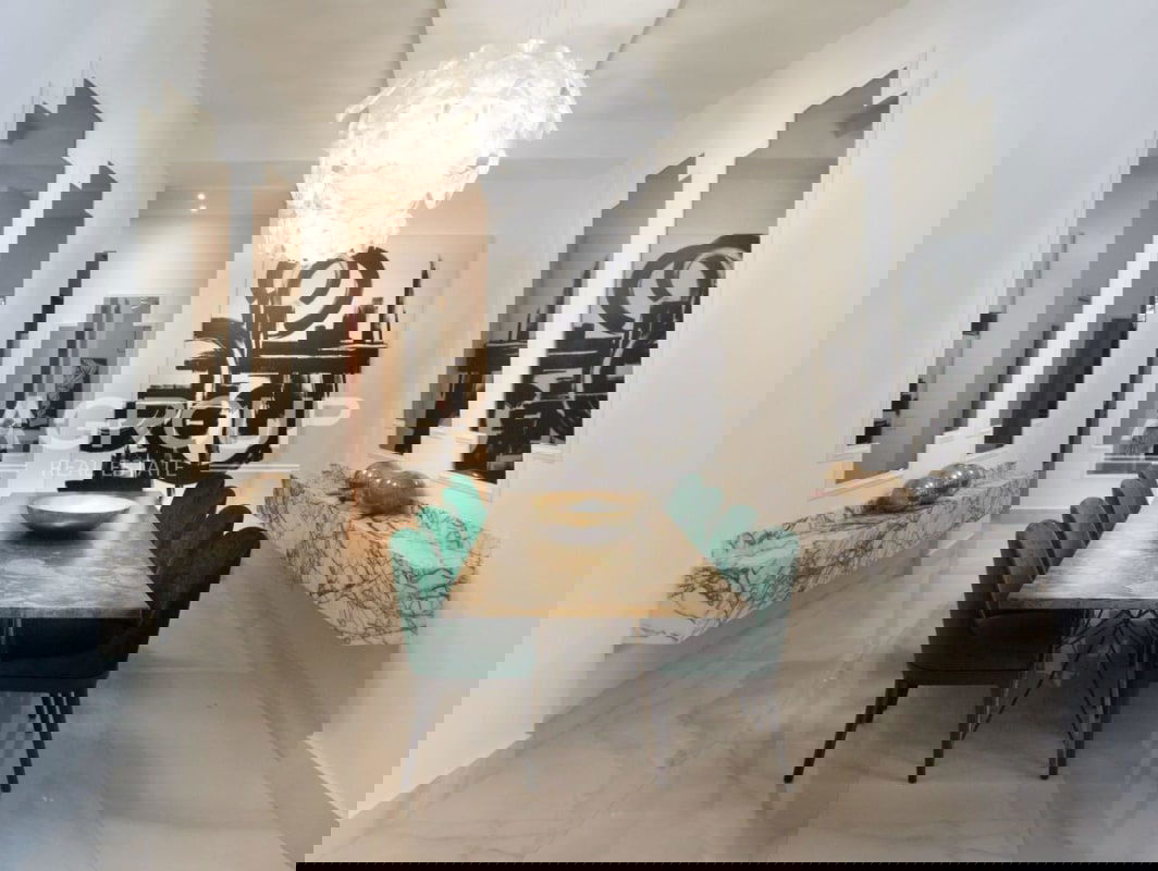 Double height living room pool view modern decor Costa del Este mansion Panama