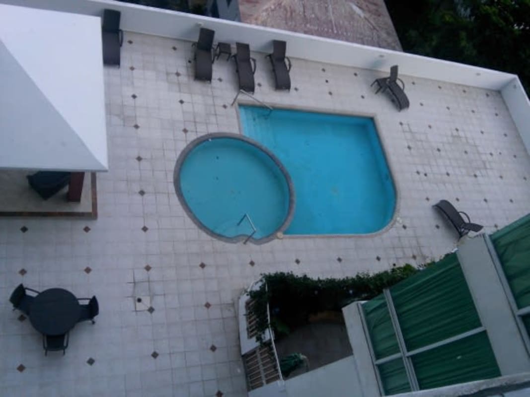 Rooftop swimming pool with city skyline views at PH Cosmopolitan in San Francisco, Panama City