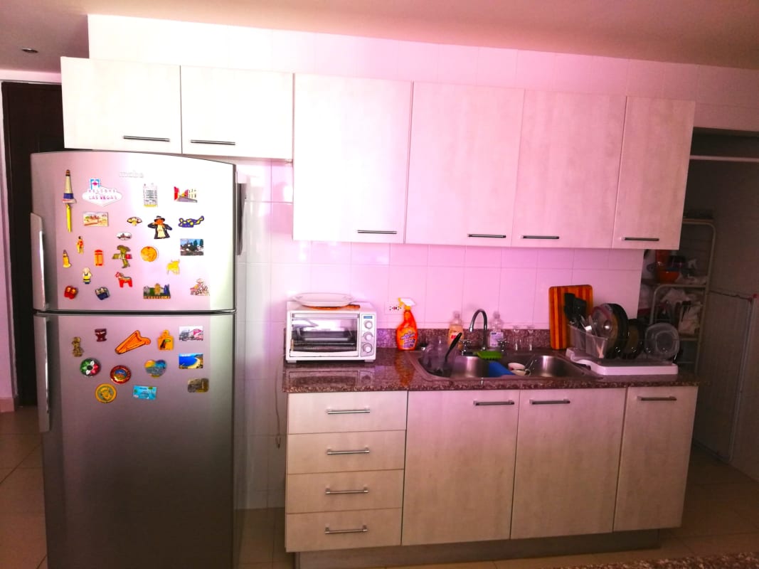 Modern bathroom with glass-enclosed walk-in shower, vanity sink at PH Cosmopolitan Panama