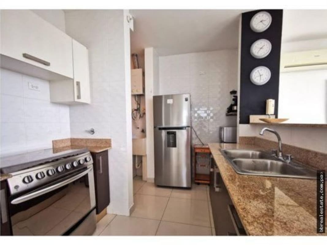 Kitchen with granite countertops stainless refrigerator stove oven PH Park Loft Panama