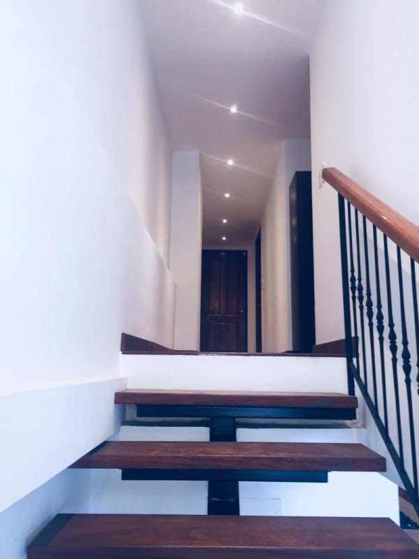 Remodeled kitchen with island and stainless appliances in Casco Viejo Panama apartment for sale