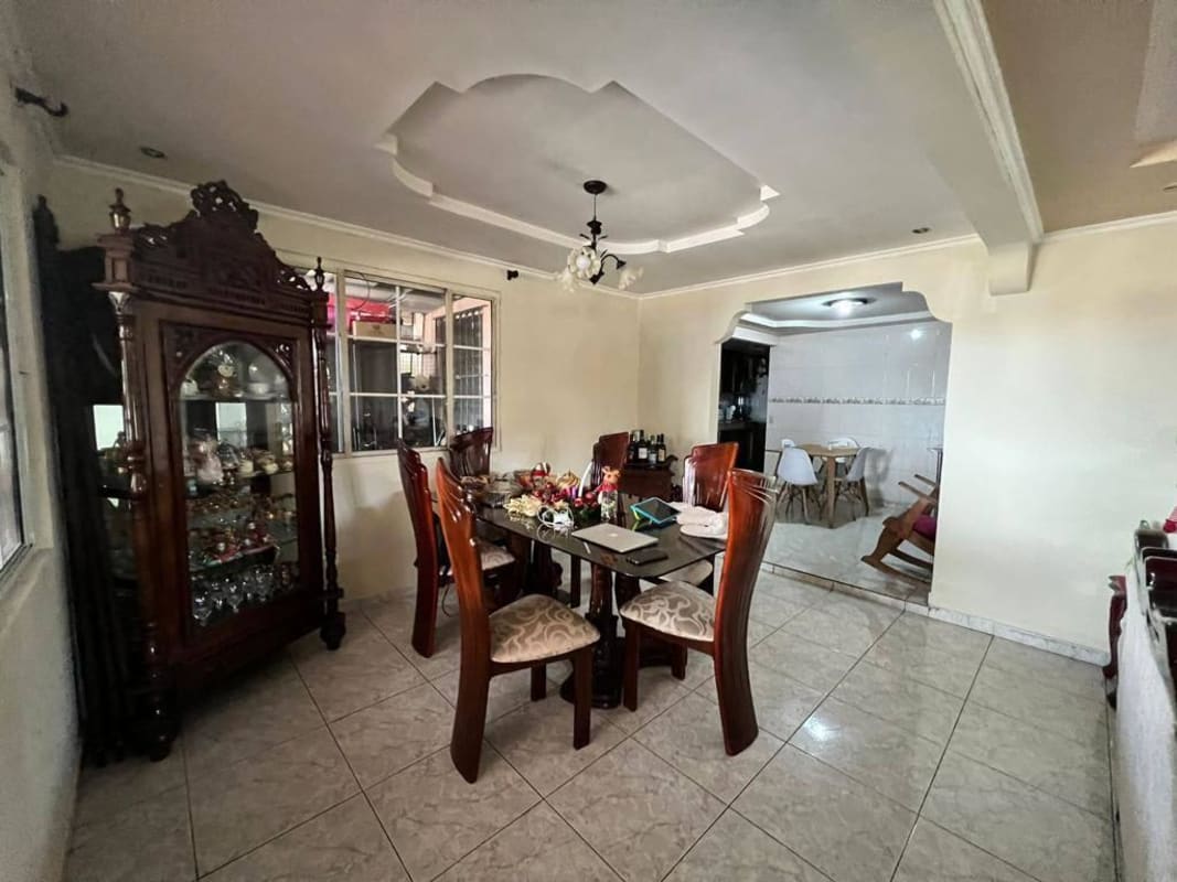 Open living and dining area with tile floor and large windows house for sale Don Bosco Panama
