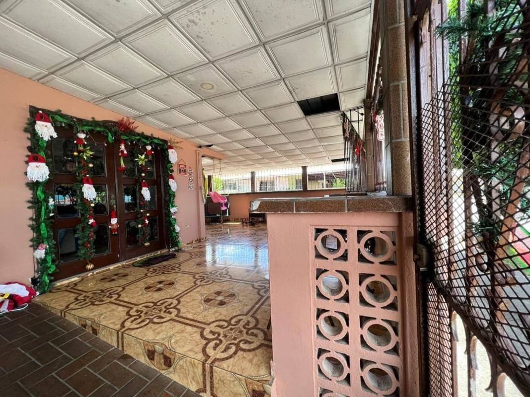 Covered porch with decorative tile flooring home for sale Don Bosco Panama City