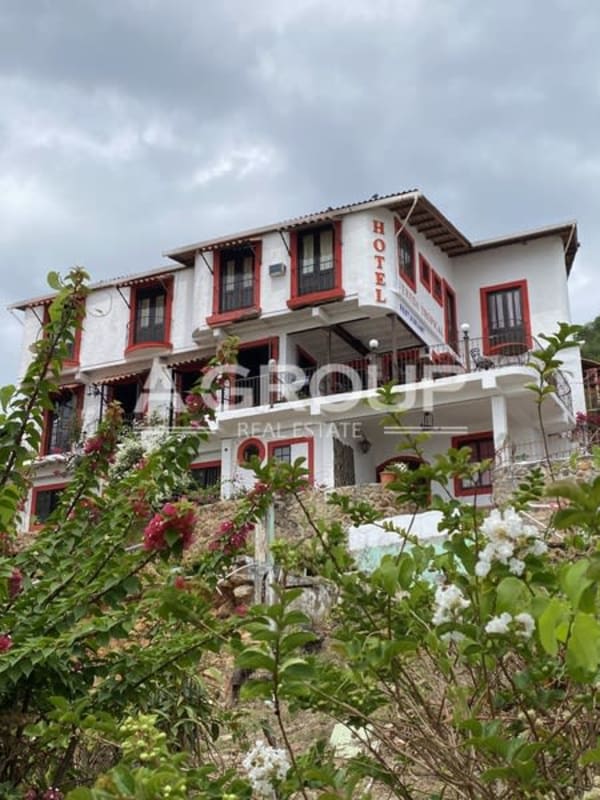Covered restaurant terrace with ocean and marina views at Isla Taboga hotel Panama