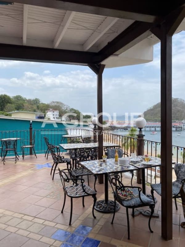 Covered outdoor patio overlooking bay with dining Isla Taboga Panama