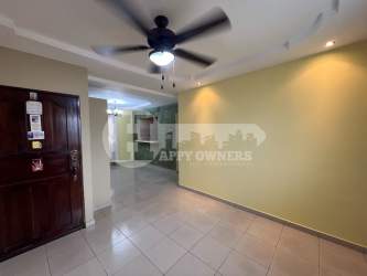 Traditional kitchen with wood cabinets tiled counter in Residencial Blas Tello Chitré
