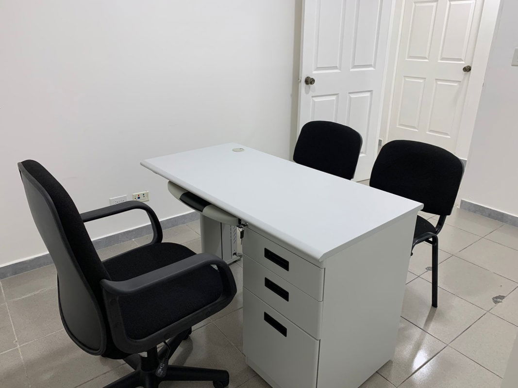 Small bright furnished office for rent with chairs and desk The Century Tower Panama