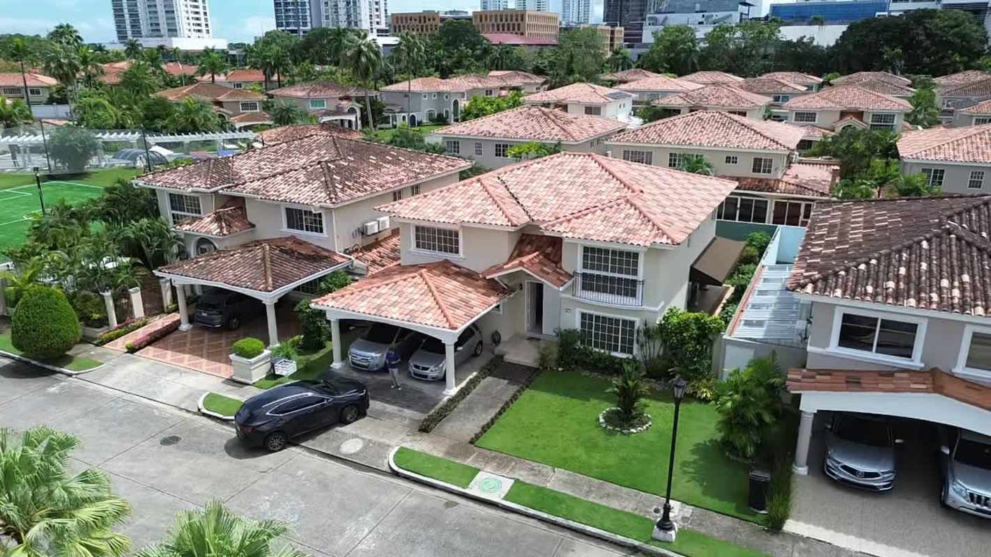 Mediterranean style homes with terracotta roofs in gated Costa Azul community Panama City