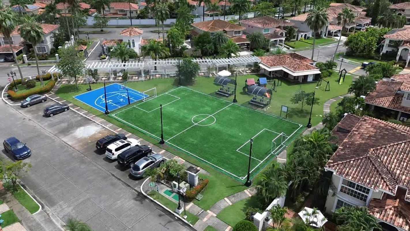 Elegant entrance foyer with decorative iron staircase in Costa Azul residence Panama
