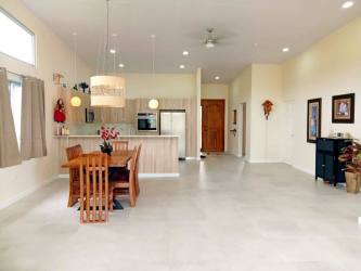 Spacious bedroom with large window, natural light and mountain view in Alto Boquete house for sale