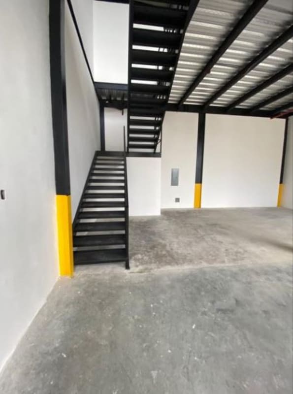 Spacious warehouse interior with steel beams, concrete flooring and mezzanine option Pacora Panama