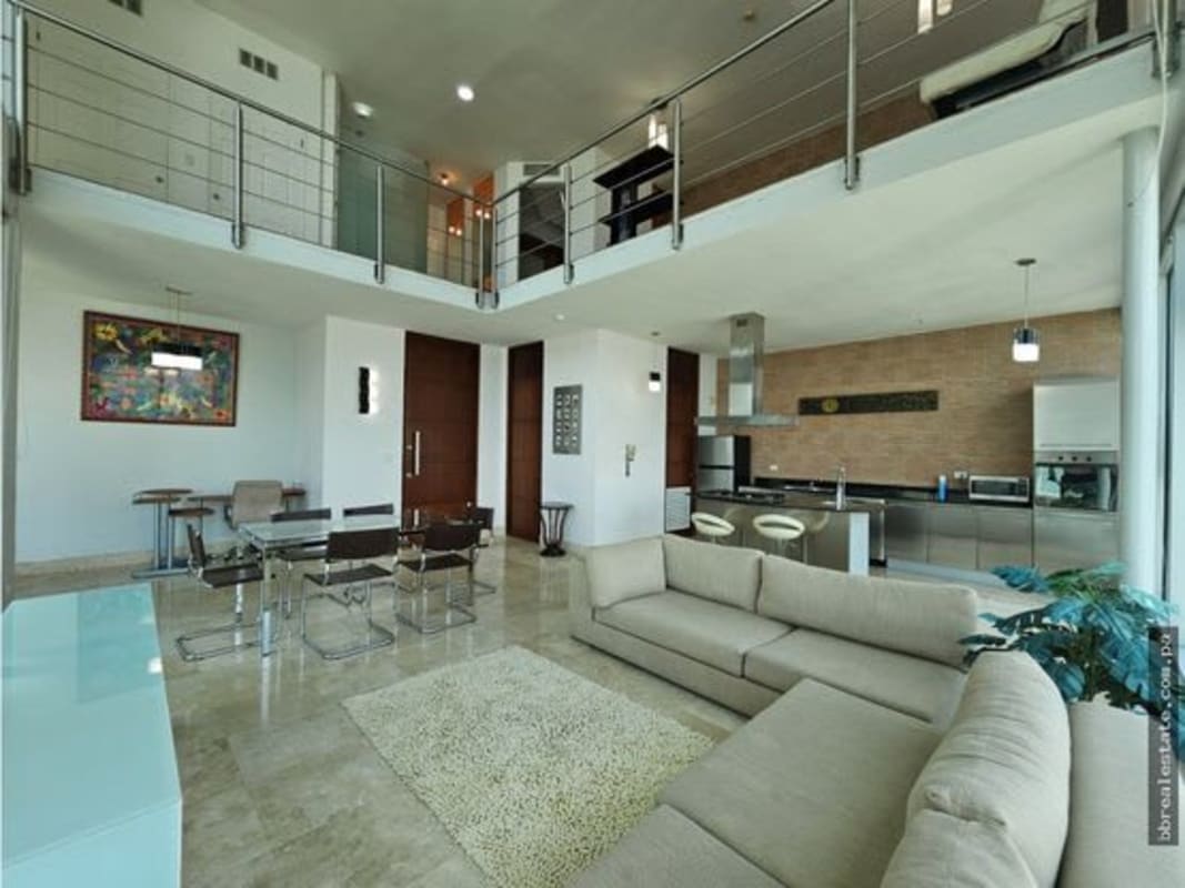 Sleek stainless steel kitchen with island and appliances at PH Loft Four 41 Punta Pacífica